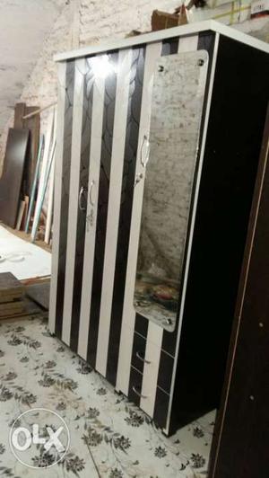 White And Black Wooden Striped Cabinet
