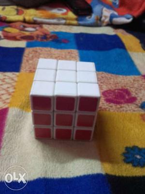 White And Red Rubbicks Cube