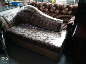 White, Brown, And Black Floral Chaise Lounge