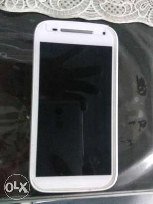 White Motorola Moto G 2nd Gen mobile phone. 2