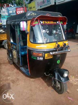 Yellow And Black Faris Auto-rickshaw