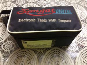 Electronic tabla with tanpura with cord
