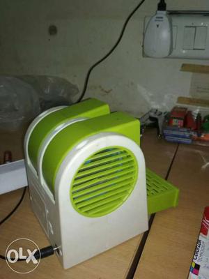 Green And White Electronic Appliance