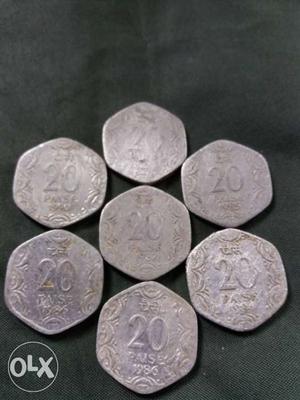 Seven 20 Indian Paise Coins