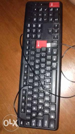 Black And Red Corded Computer Keyboard