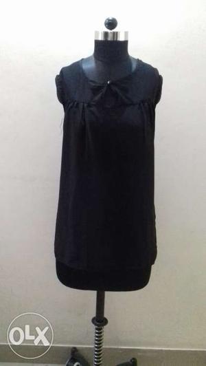 Black sleeveless top.Bulk price 100/rs