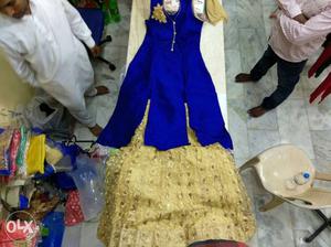Blue And Gold-colored Sleeveless Traditional Dress