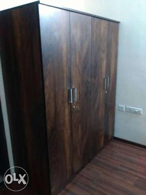 Brand new wooden four door wardrobe set its a