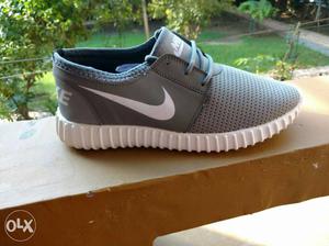 Gray And White Nike Shoe