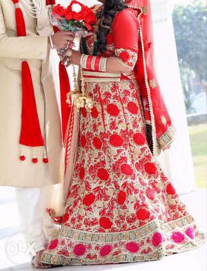 Heavy embroidery Red And Gold Floral Wedding lehnga only one