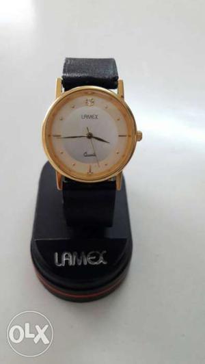 Lamex Quartz. gold round original watch, good
