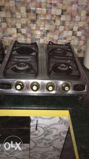 Micro flame cooktop with 4 burners.Good condition with no