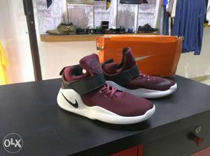 Pair Of Maroon-and-white Nike Basketball Shoes
