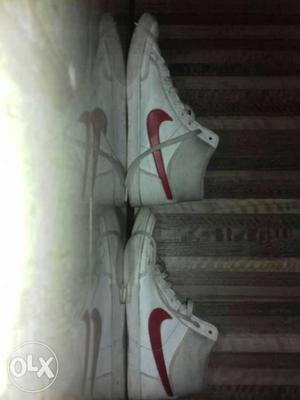 Pair Of White-and-pink Nike Sneakers
