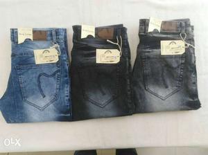 Pairs Of Blue, Black And Gray Jeans