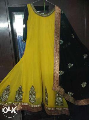 Pretty floor length party wear suit with embroidered heavy