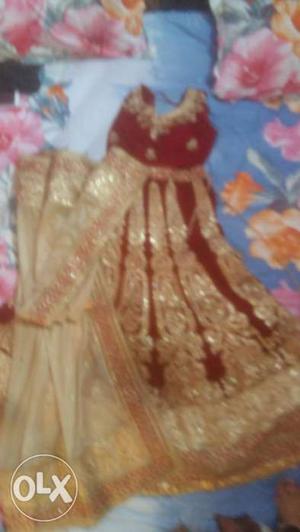Red And gold colored Floral Traditional Dress