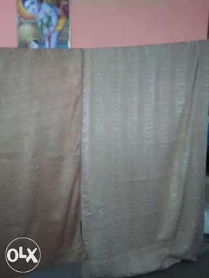 Two Gray And Brown Body Towels