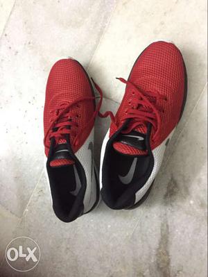 Used Red-and-white Nike Athletic Shoes