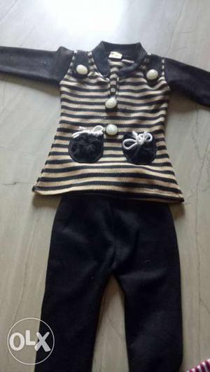 White And Black Stripe Long Sleeve Top And Black Pants