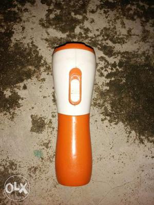 White And Orange Plastic Tool
