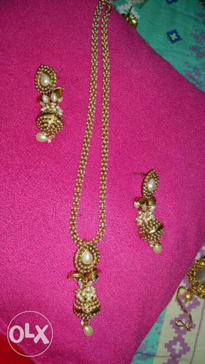 1 pearl mala with pendant necklace earrings.. 1