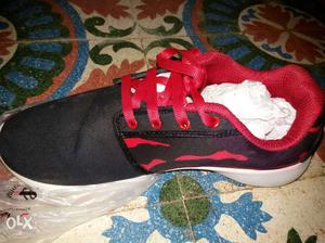 Black and red canvas shoes packed brand new for