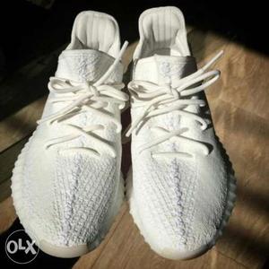 Brand new original white yeezy shoes by adidas