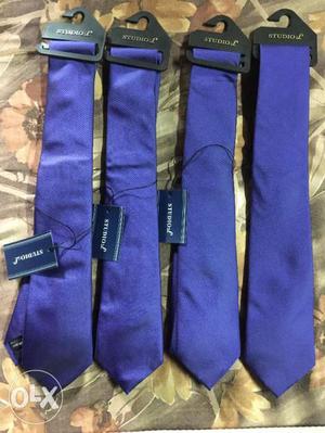 Brand new purple colour tie