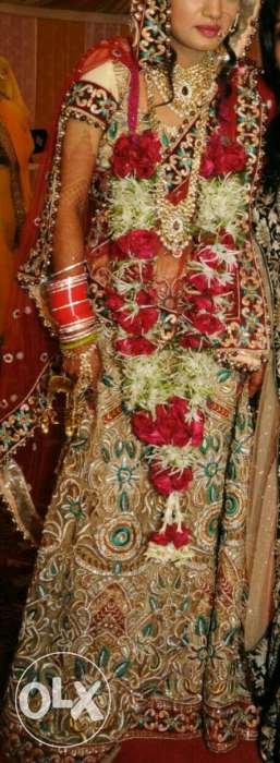 Bridal lehenga with golden work and red heavy