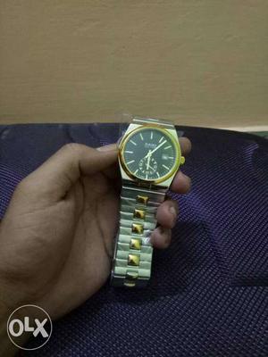 Designer watch branded with two years warranty.