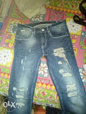Distressed Blue Jeans 32 size