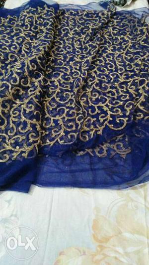 Golden n blue beautiful net embroidrd fabric,5