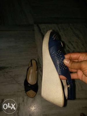 Khadims blue colour wedge shaped shoe in an