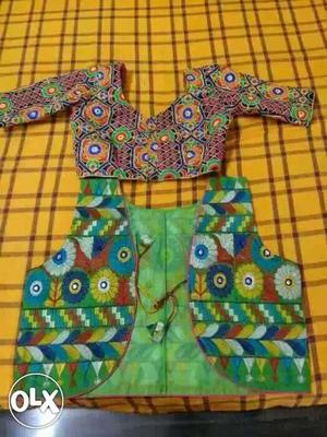 Kutch work embroidery blouse n half sleeve