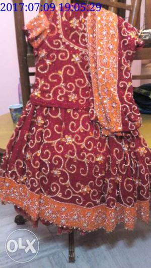 Orange And Red Floral bridal lehnga with heavy work
