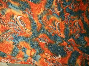 Orange, Gray, And Yellow Floral Textile
