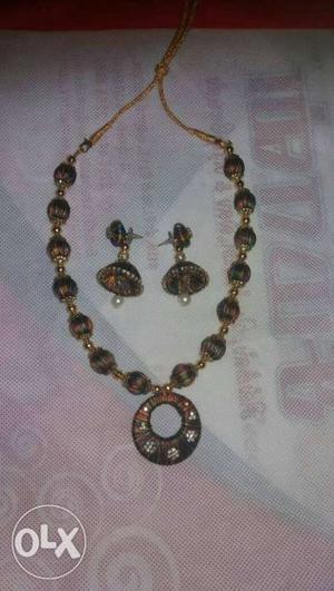 Pair Of Black Brooch And Beaded Necklace