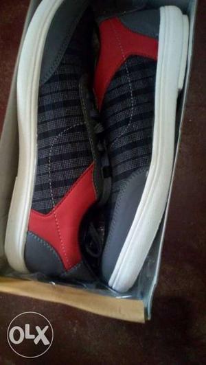Pair Of Black-and-red Low-top Sneakers In Box