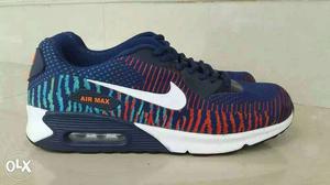 Pair Of Blue, Orange And White Nike Air Max Low