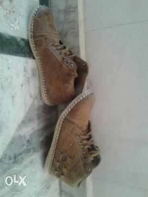Pair Of Brown High-top Shoes