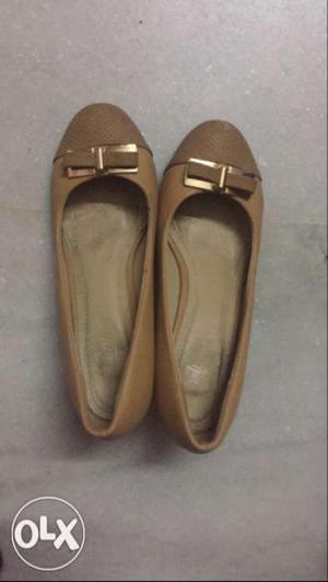 Pair Of Brown Leather Flat Shoes