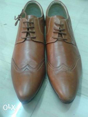Pair Of Brown Leather Oxford Wingtip Shoes