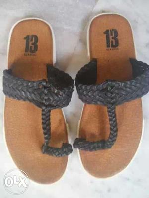 Pair Of Brown-and-black Elather T-strap Flat Sandals