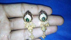 Pair Of Emerald Embellished Gold Dangle Earrings