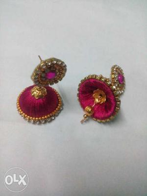 Pair Of Gold And Red Jhumka Earrings