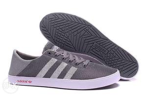 Pair Of Gray-white Adidas Low Top Sneakers