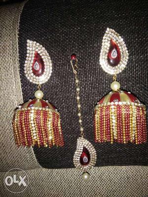 Pair Of Red-and-beige Jhumka Earrings
