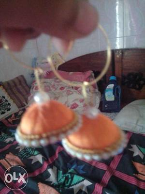 Pair Of Salmon-pink Jhumka Earrings