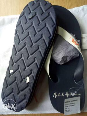 Pair Of White-and-black Mast & Harbour Flipflops